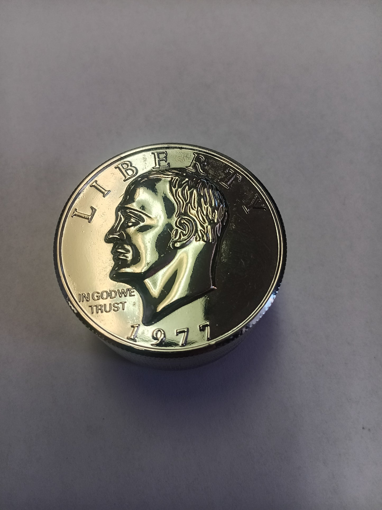 Silver Dollar 3 piece grinder.