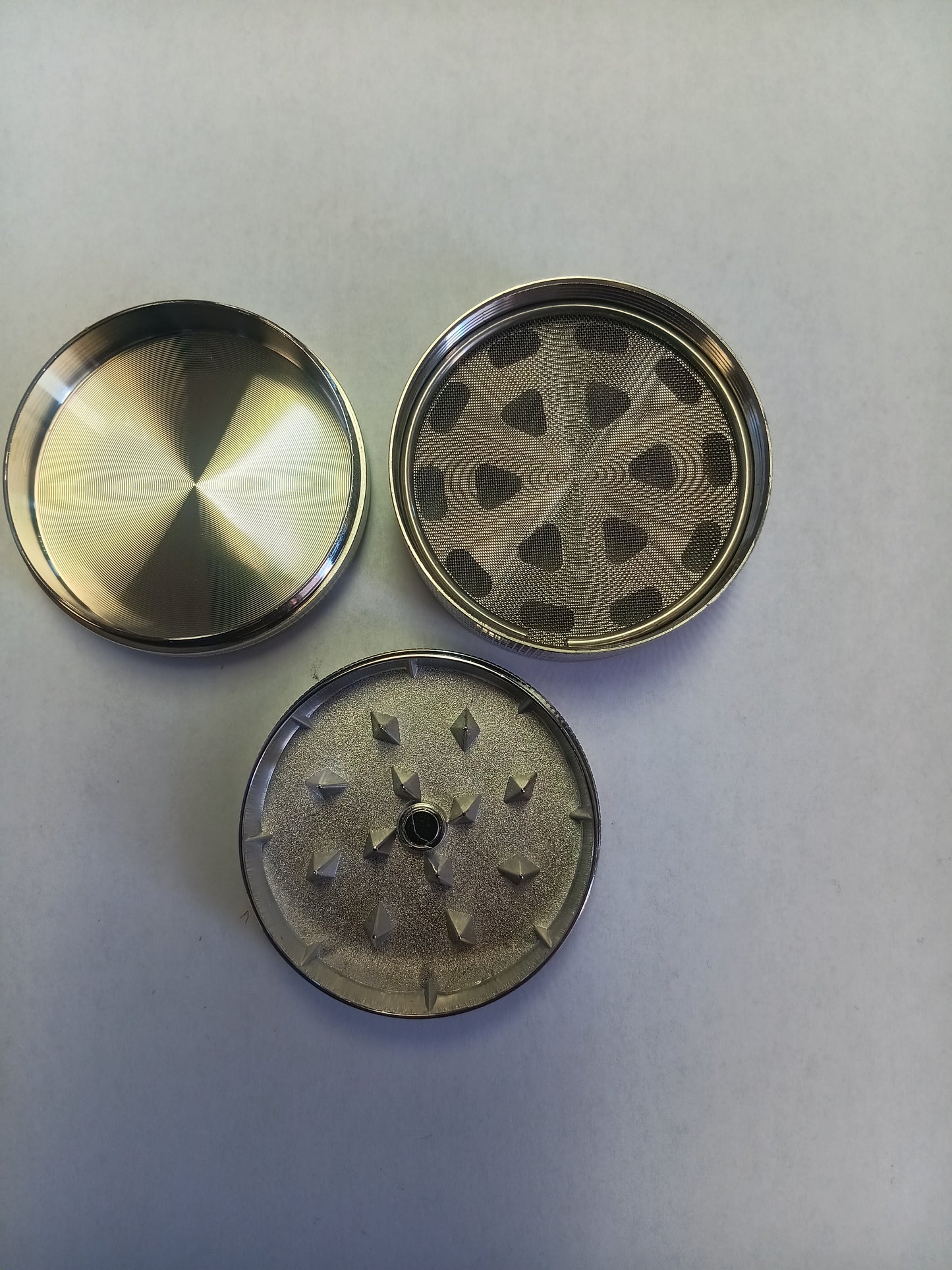 Silver Dollar 3 piece grinder.