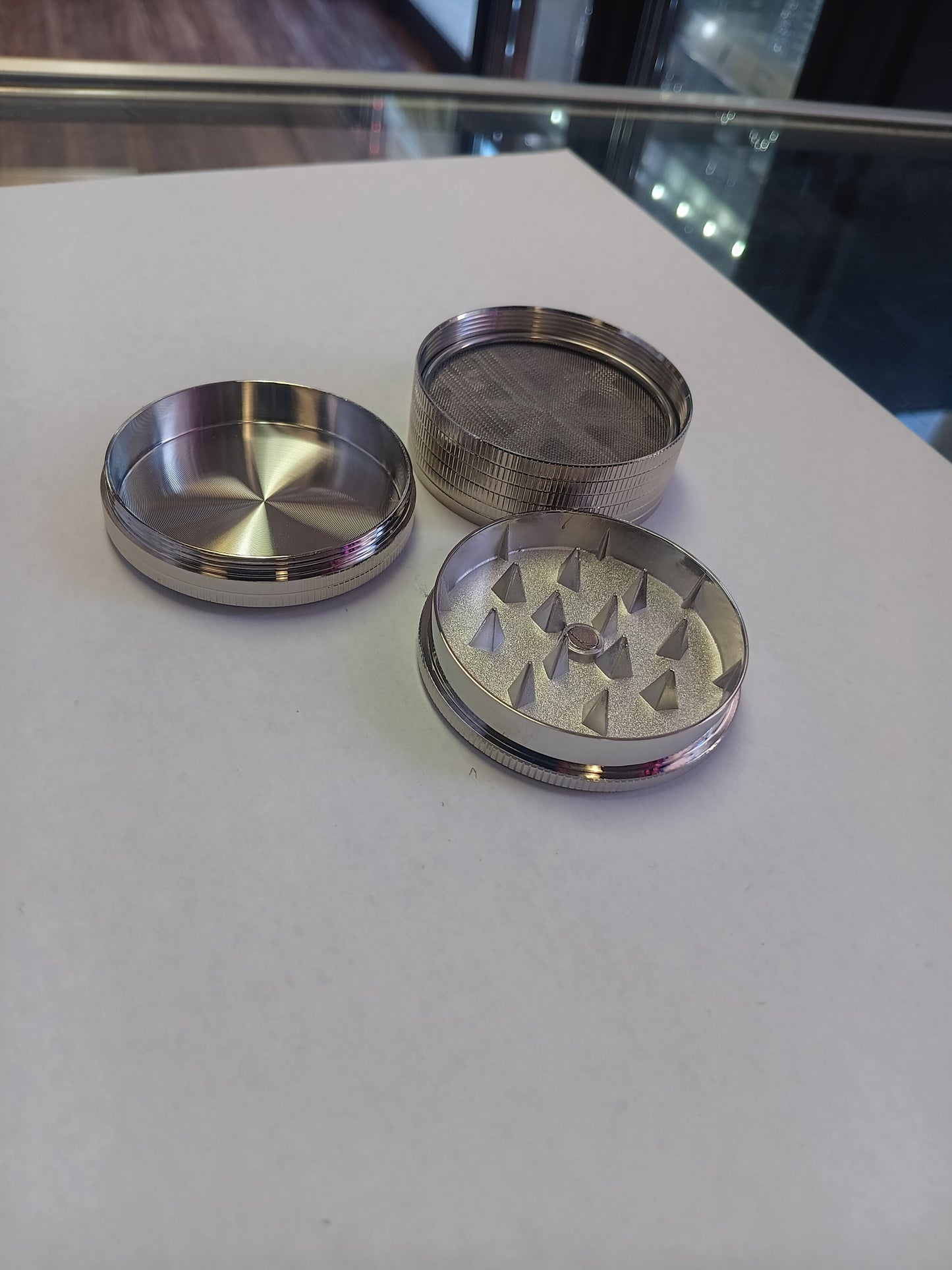 Silver Dollar 3 piece grinder.