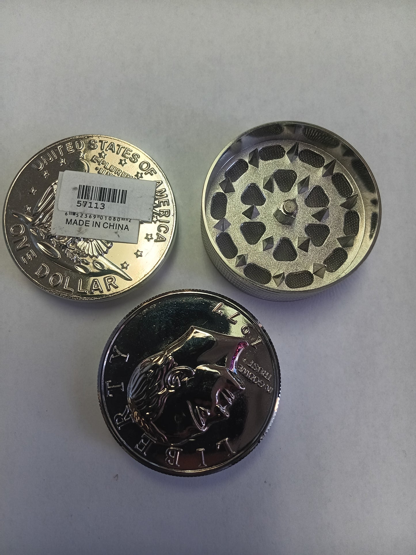 Silver Dollar 3 piece grinder.